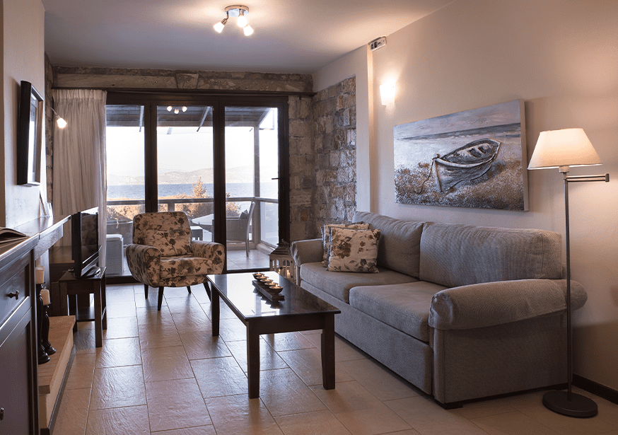 Interior with sofa, tv and balcony sea view